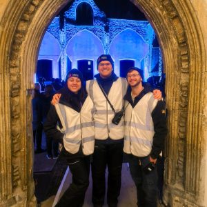 Event Stewards standing in front of a church